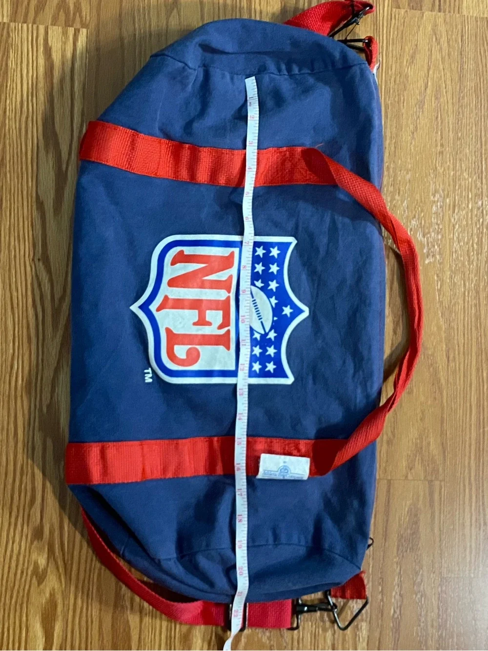 Vintage NFL Navy Duffel Bag with Red Straps and Logo